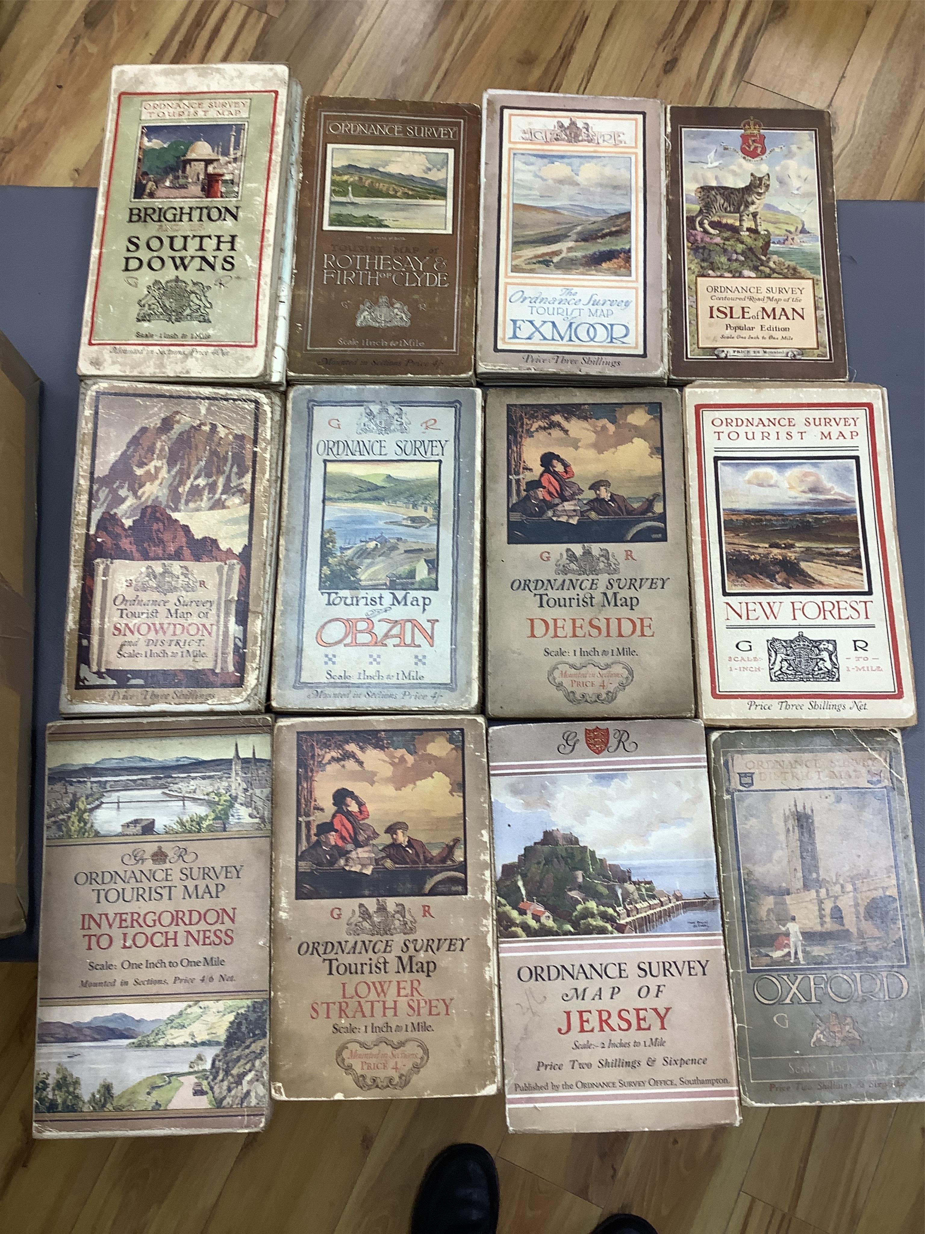 Twenty, one inch Ordnance Survey maps, together with thirty Ordnance Survey Tourist Maps, etc, 1920s/30s (50). Condition - poor to fair.